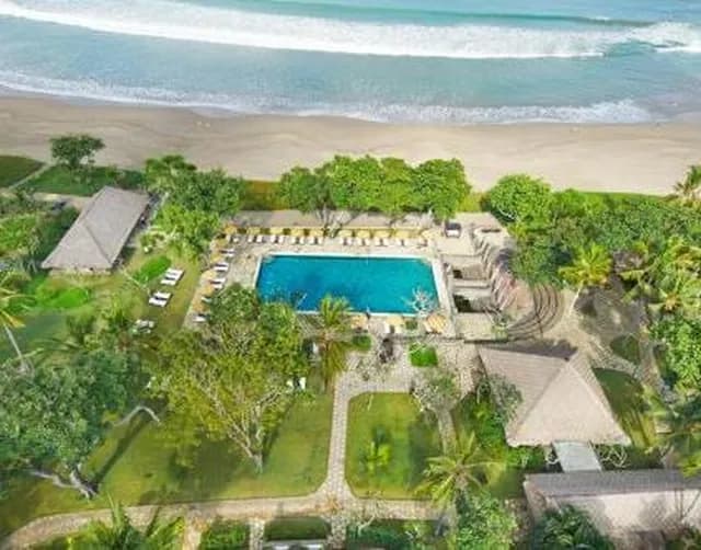Beachfront resort grounds at Seminyak, Bali, seen from the air